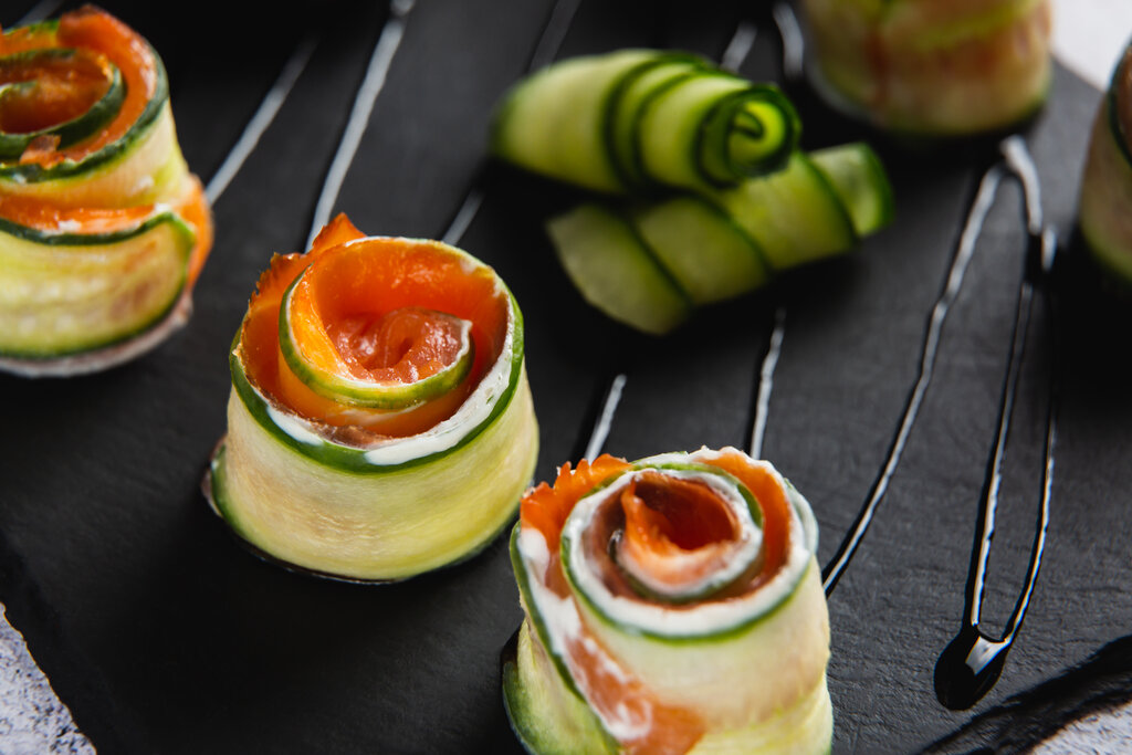 rsz close up of zucchini rolls with salmon and soft ch 2023 11 27 05 23 11 utc